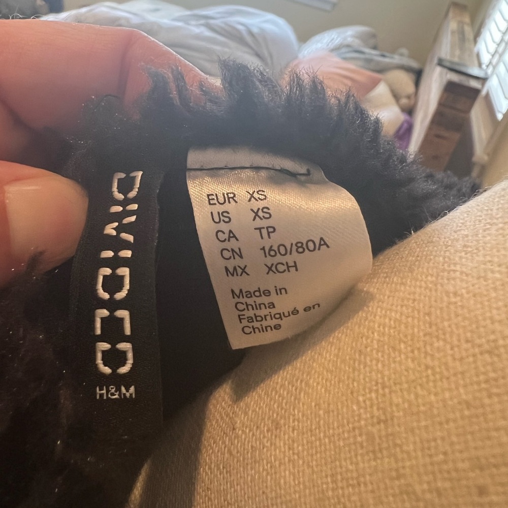 H&M fuzzy little jacket. Light, but fluffy. Slight shimmer in the fabric. - Picture 3 of 4